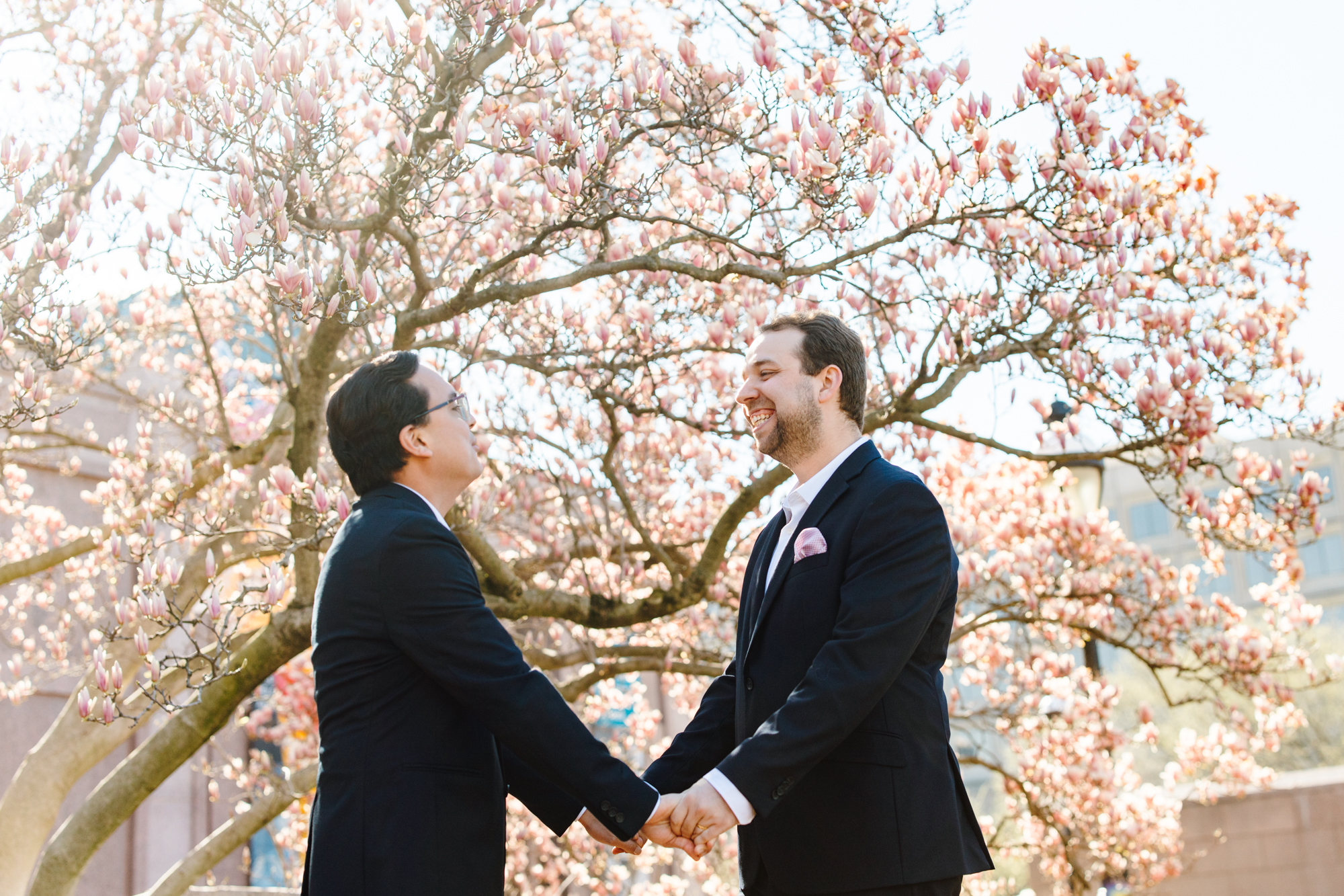 gay couple sharing vows at self officiated elopement at enid a haupt garden dc
